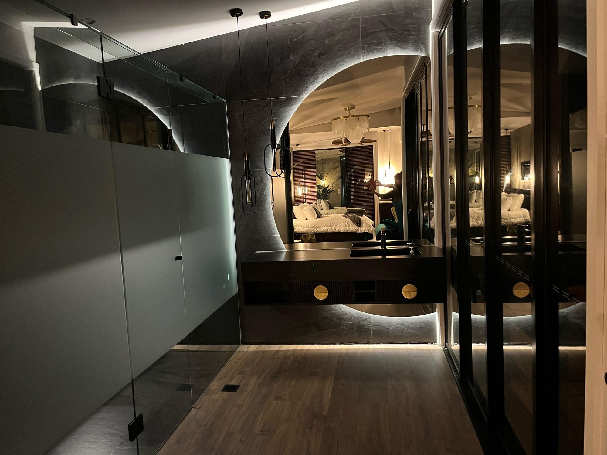 Designer villa bathroom lit at night