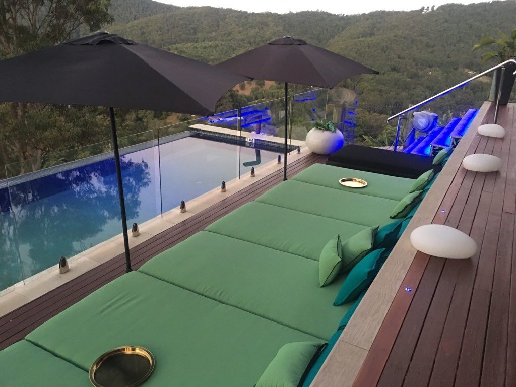 Poolside day beds in the evening