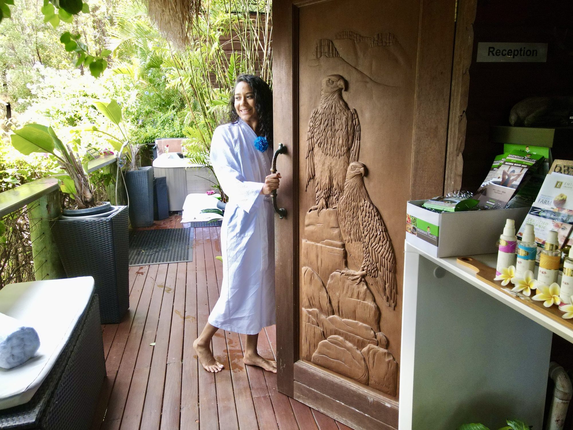 Guest beside the carved eagle door