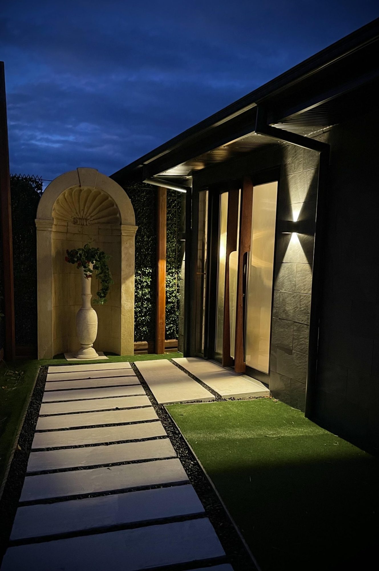 Villa entrance path at dusk